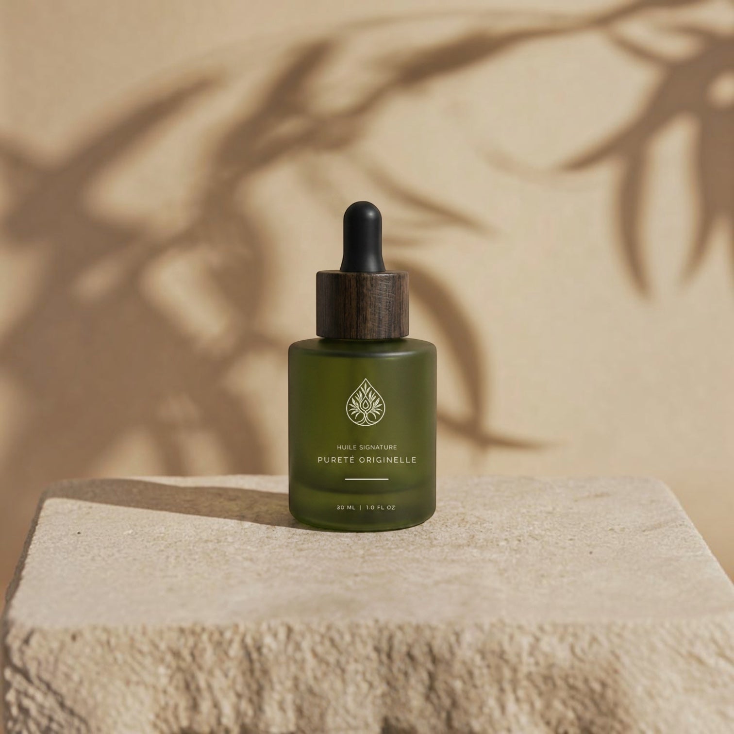 L'Arbre de paix Pureté Originelle fragrance-free signature oil in a green frosted glass bottle with a wooden dropper.